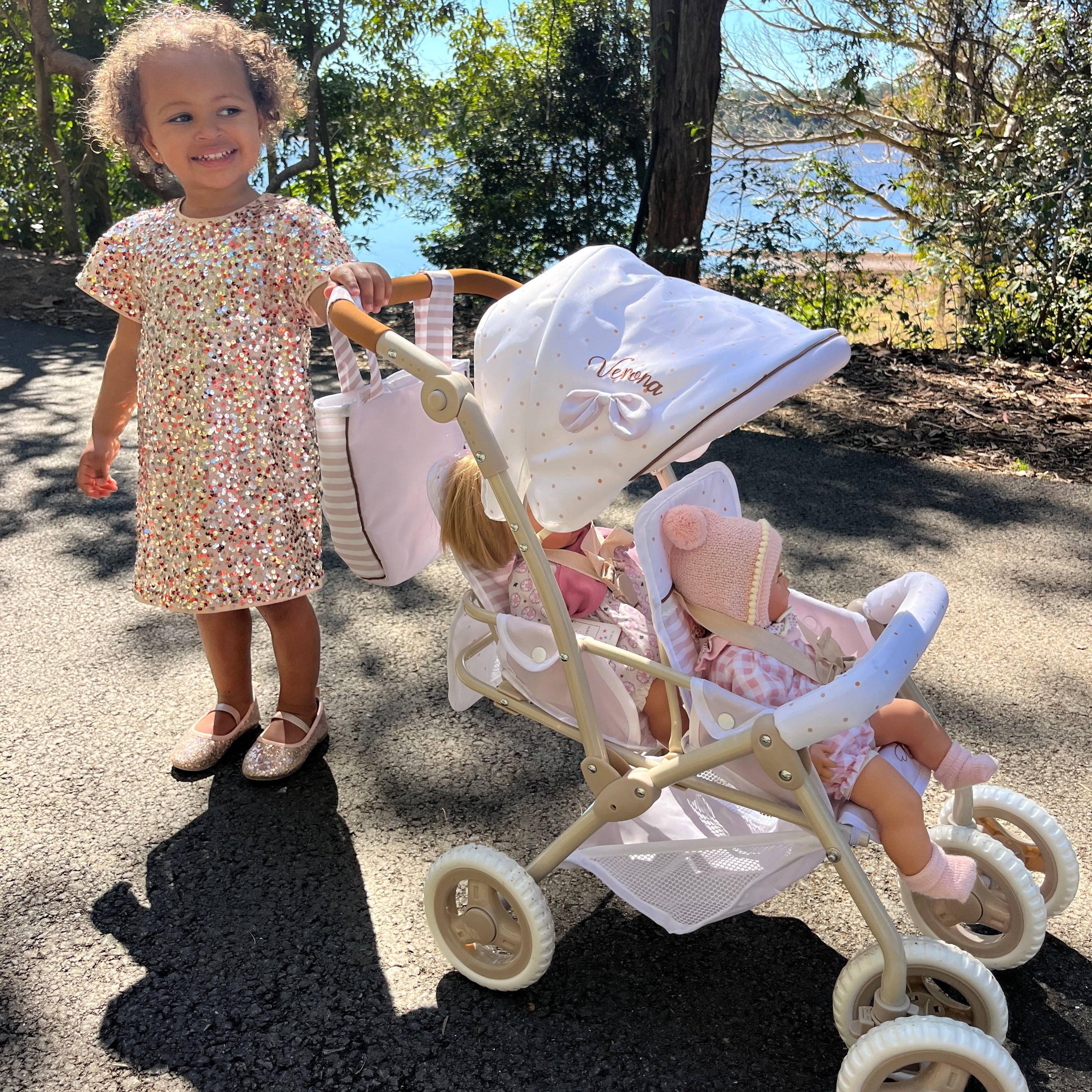 DeCuevas Toys Verona Folding Twin Doll Pram with Bag